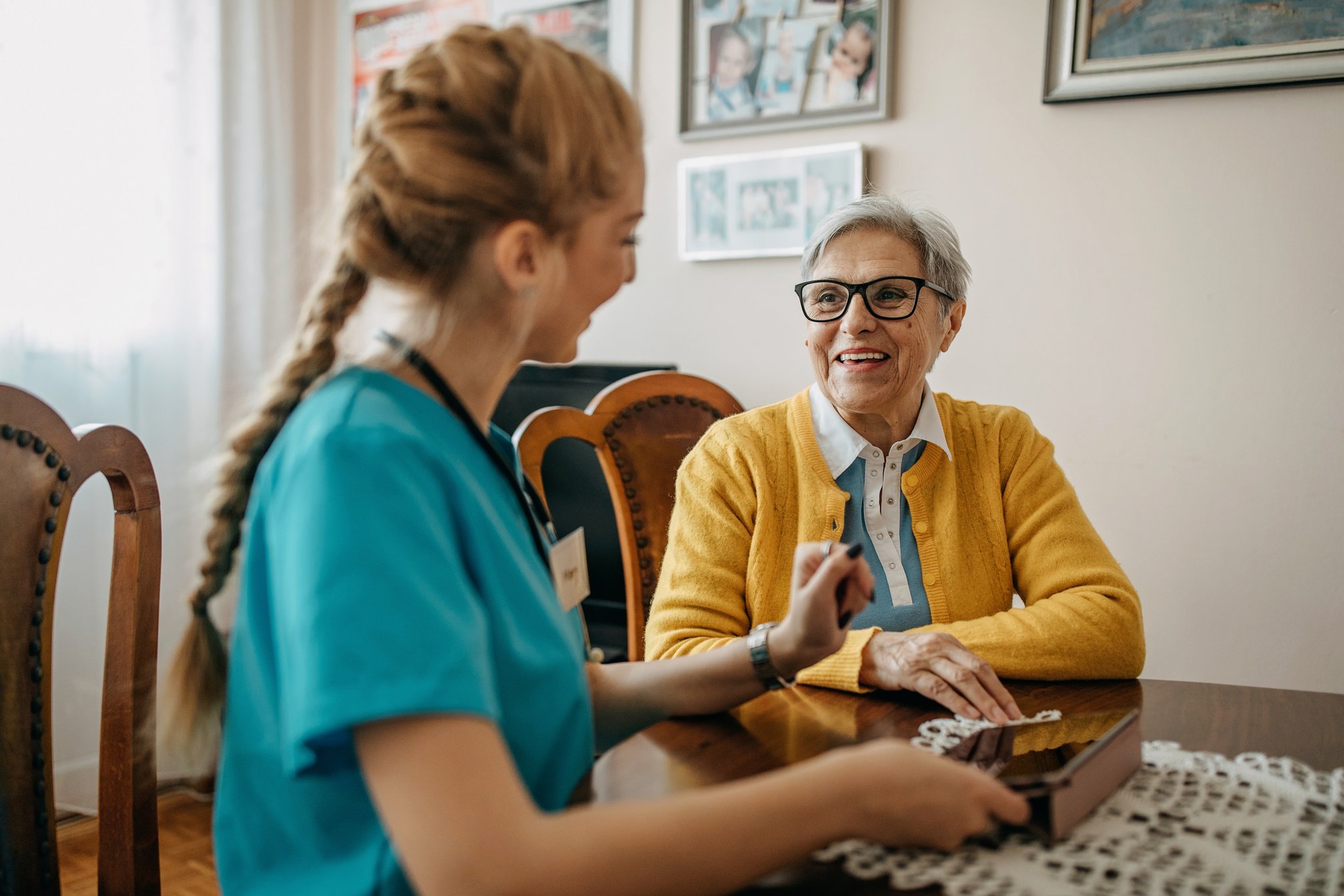 Senior woman visited by home care specialist